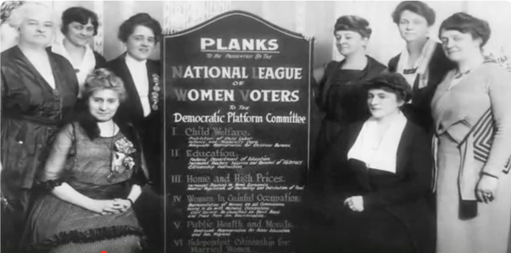 photo ladies with sign board