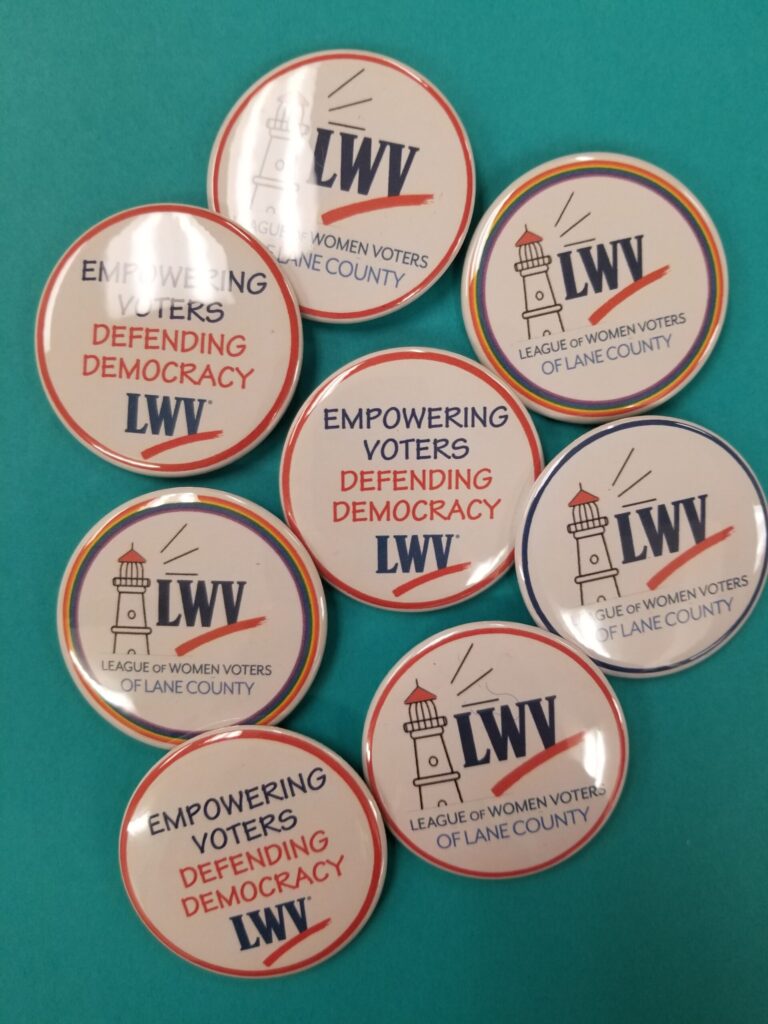 LWV buttons Empowering. Defending